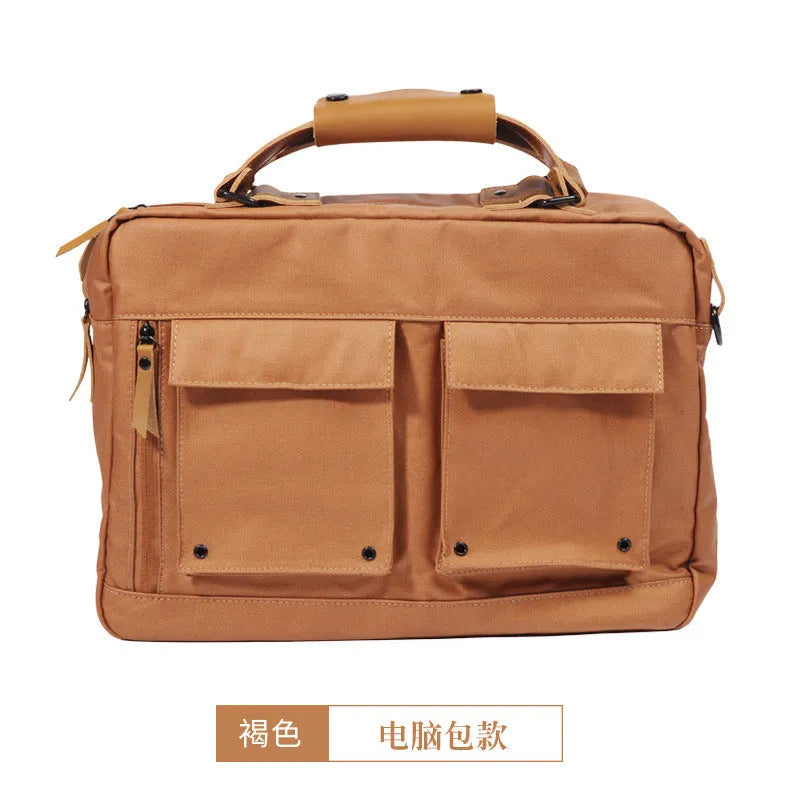 Dpark black laptop shoulder bag for 14-inch and 15-inch laptops on a table