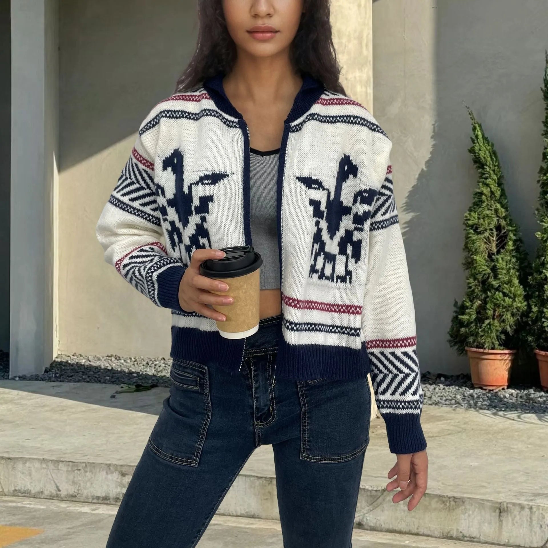 White women's wool Jacquard cardigan with a contrast colour stripe pattern on the front.
