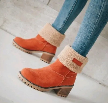 Women's suede mid-tube snow boots in multiple colours with a round toe and low thick heel.
