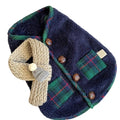 Navy blue pet fleece jacket with checkered pattern, Sherpa lining, decorative buttons, and snowman accent on a small dog
