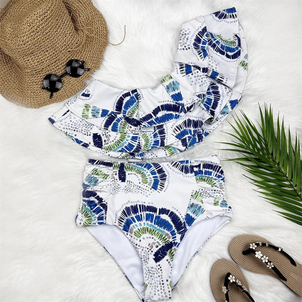 White women's one-shoulder swimsuit with a double-layer lotus leaf split design.