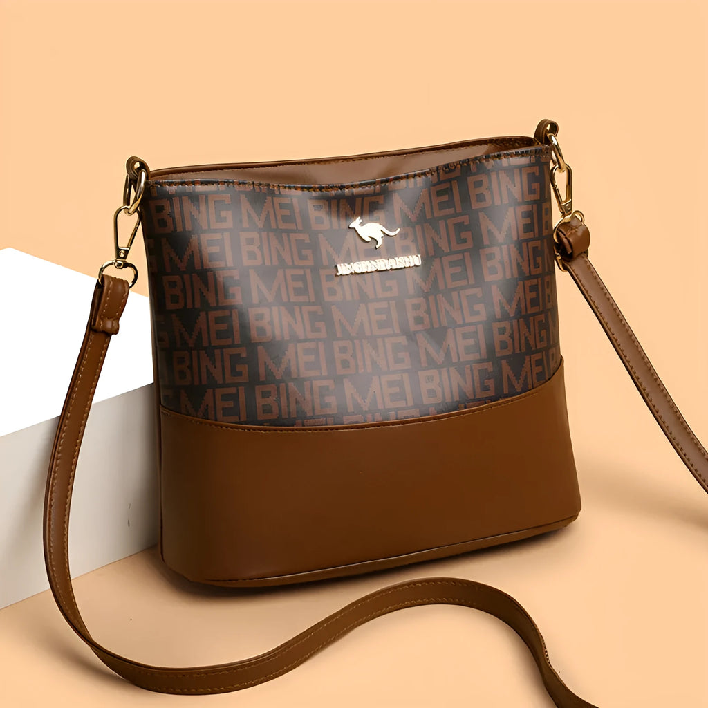 Retro brown soft leather messenger bag with organised compartments and three-dimensional external pocket