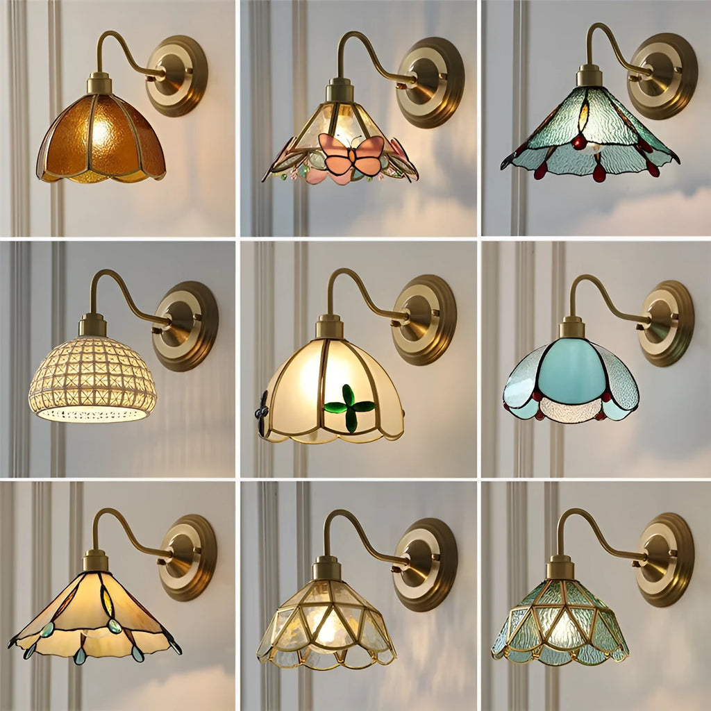 Retro brass glass wall lamp with stone pattern shade in transparent colour, mounted on a wall