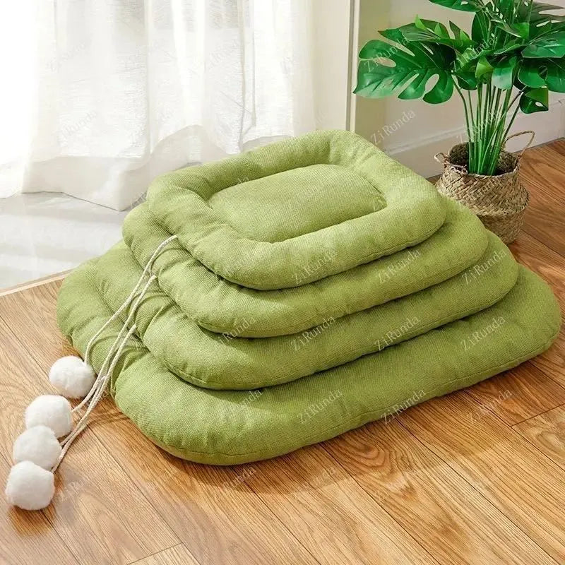 Kennel cooling cushion with removable cover in brown, shown next to S, M, L, XL size indicators