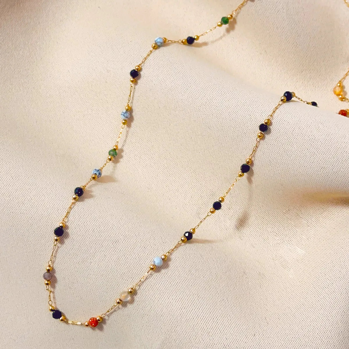 Gold-coloured titanium steel necklace with a retro O-ring chain and simple pendant.