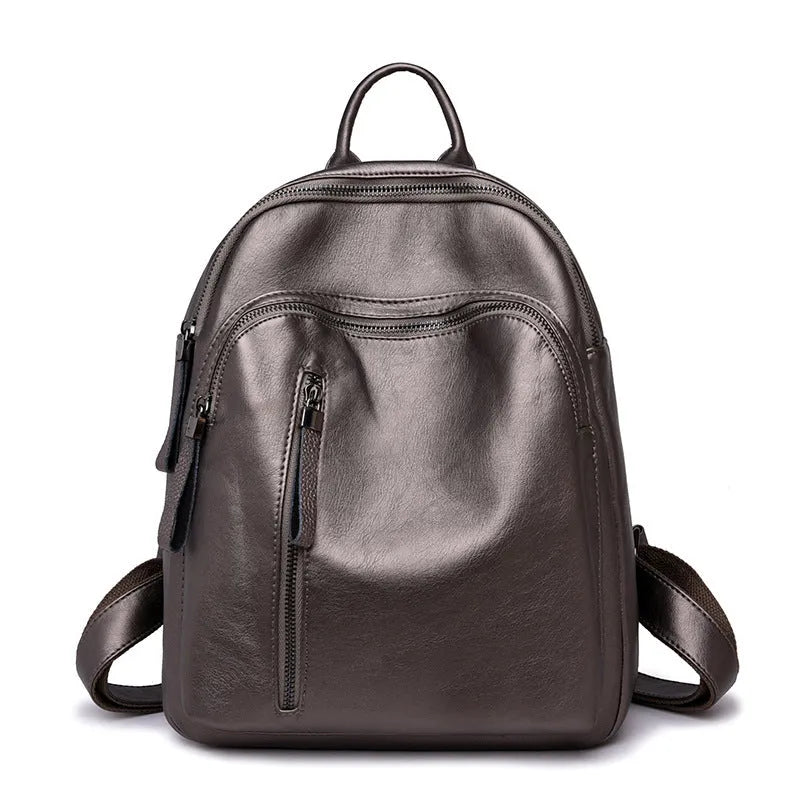 Ladies PU backpack in colour block design with zip pockets and document bag, vertical square shape, black blue or red.