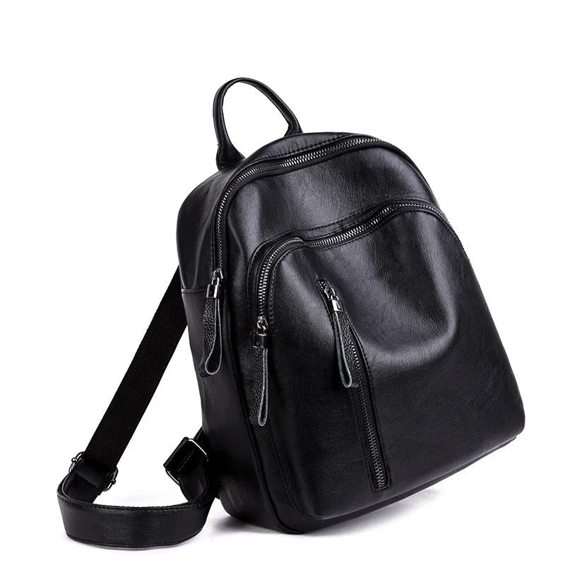 Ladies PU backpack in colour block design with zip pockets and document bag, vertical square shape, black blue or red.