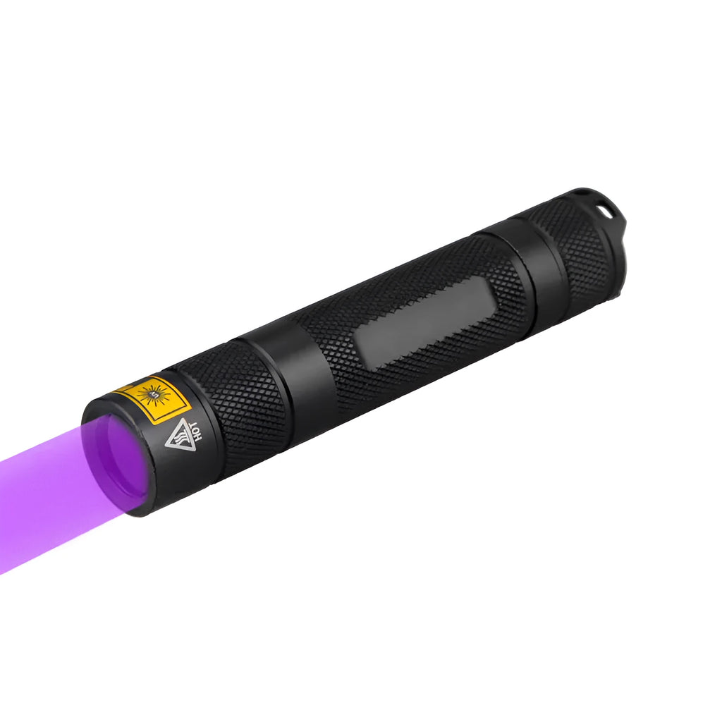 Black aluminium alloy handheld UV flashlight emitting 365nm ultraviolet light for detection tasks.