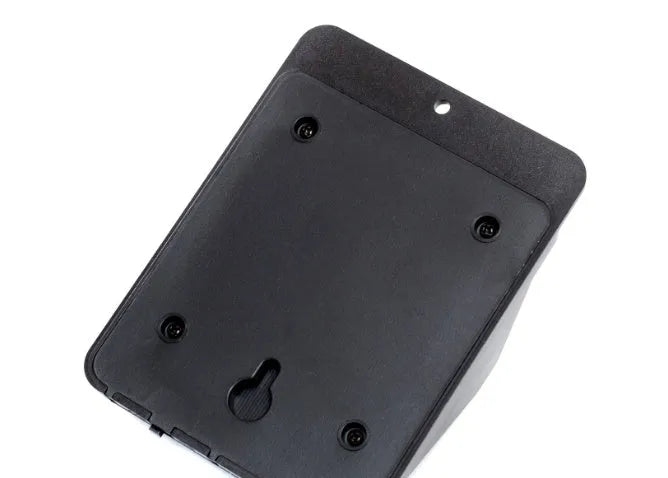 Four white rectangular solar-powered LED security lights with motion sensors mounted on an outdoor wall.