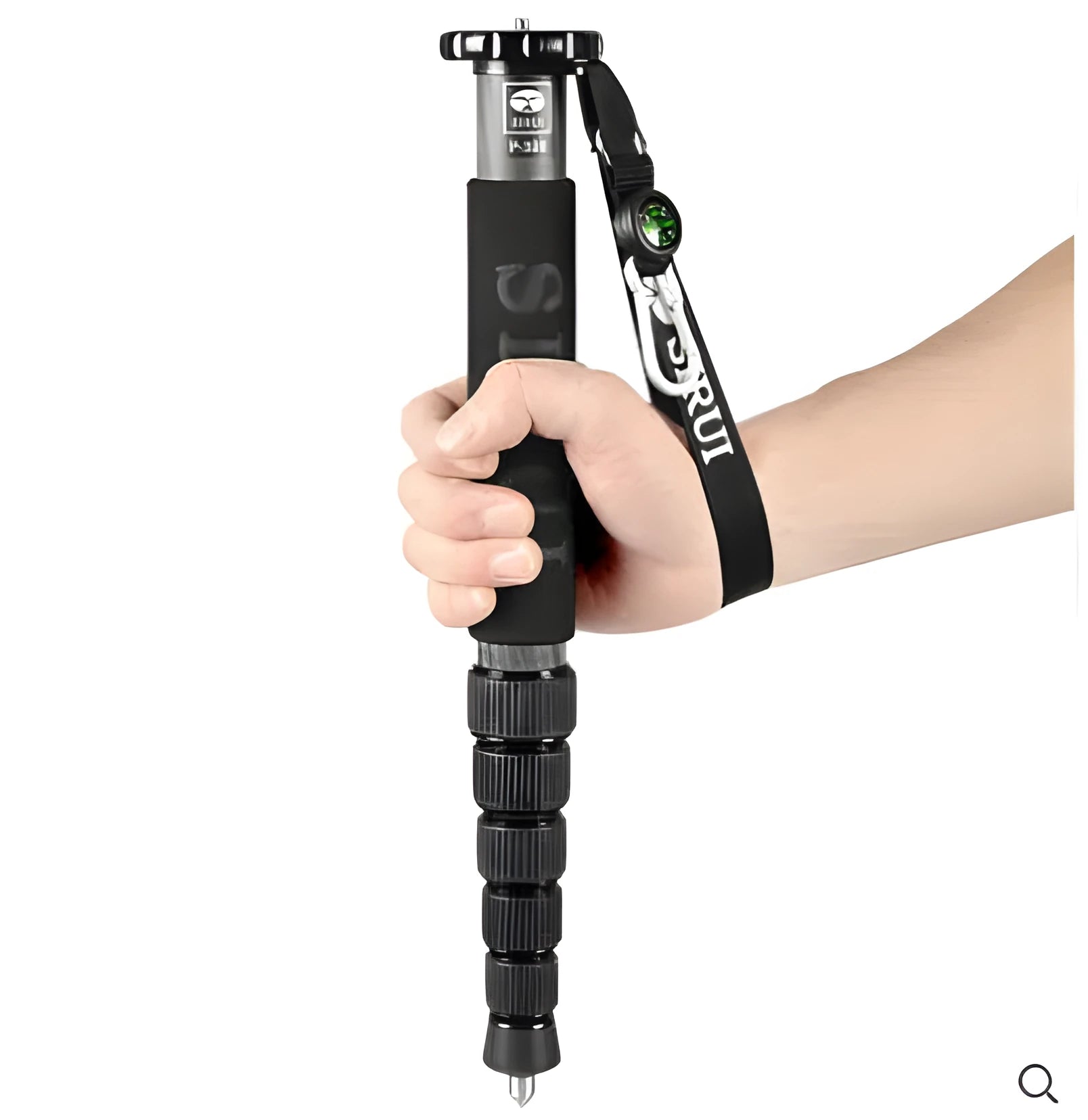 Black carbon fibre telescopic camera monopod extended to maximum height