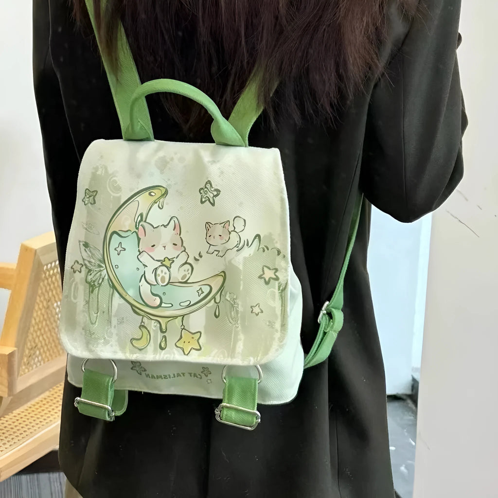 Mint green backpack with spliced design, polyester fabric, and sandwich pockets on neutral background.