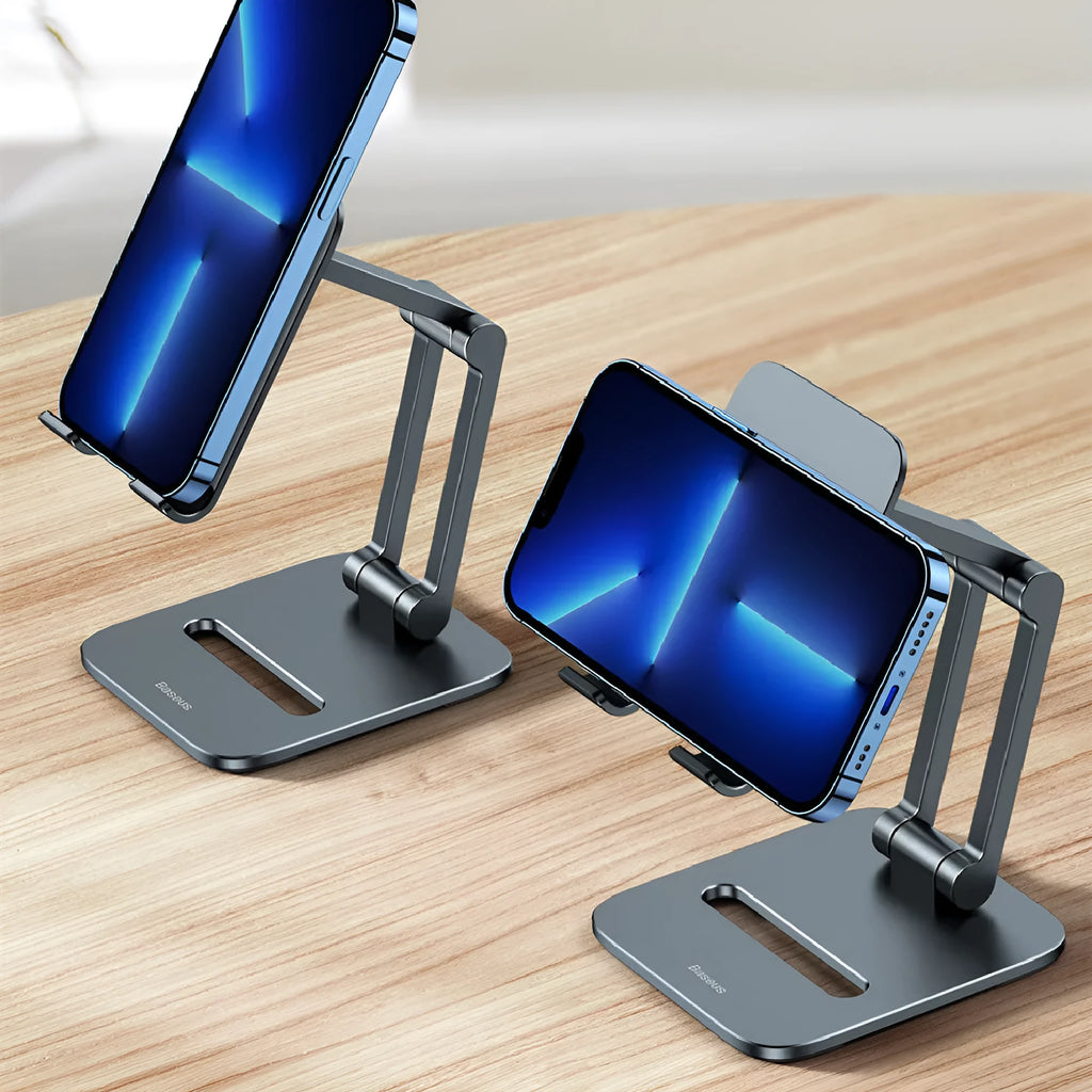 Deep space grey aluminium folding stand for a tablet and a mobile phone.