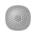 Square TPR floor drain cover, approx. 145mm, in dark grey, orange, white, dark green, or lake blue, for kitchen and bathroom drains.