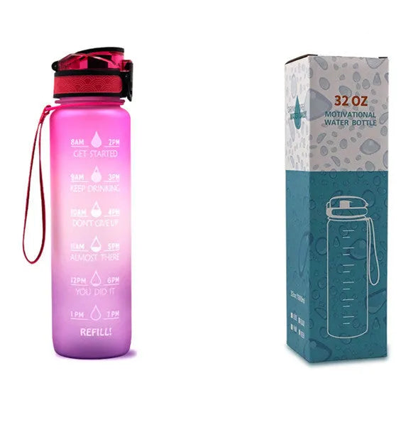 Blue-red gradient 1L Tritan water bottle with time markers and flip-top lid on a gym bag
