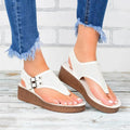 Women's platform wedge sandals with cutout stitching in black, artificial PU upper and rubber sole