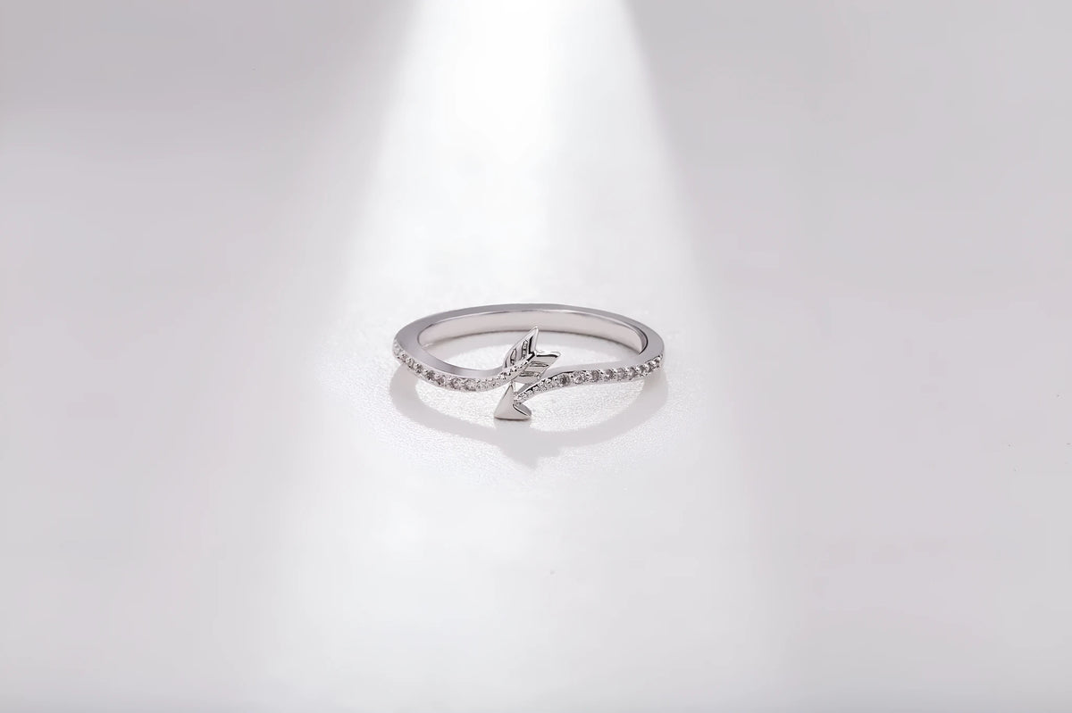 Women's arrow feather ring with white copper plating and cubic zirconia, available in US sizes 5-8