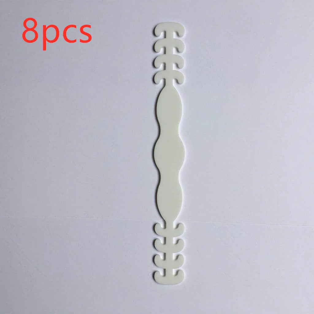 Eight silicone tool buckles in red, yellow, black, white, violet, pink, blue, and green colours.