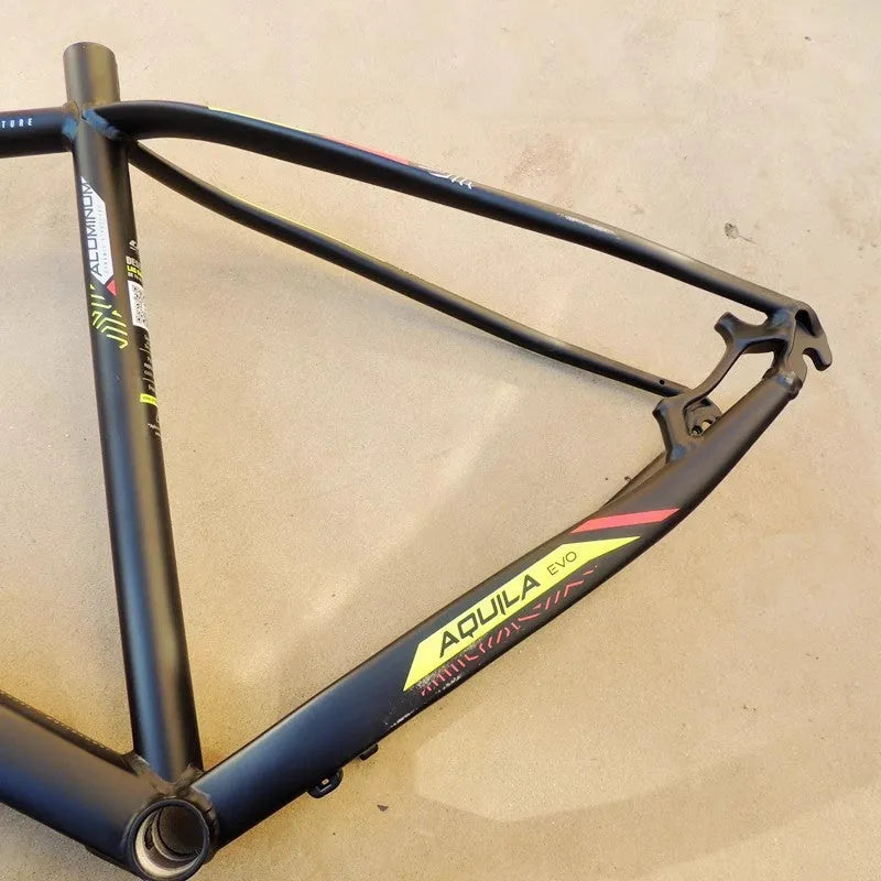 Black green aluminium mountain bike frame with inner cable routing and disc brake mounting points