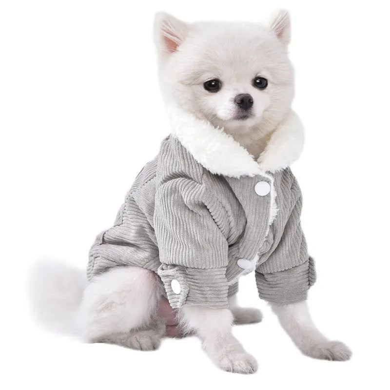 A gray lambswool-lined vest for a dog, showing the padded fleece construction and vest style.