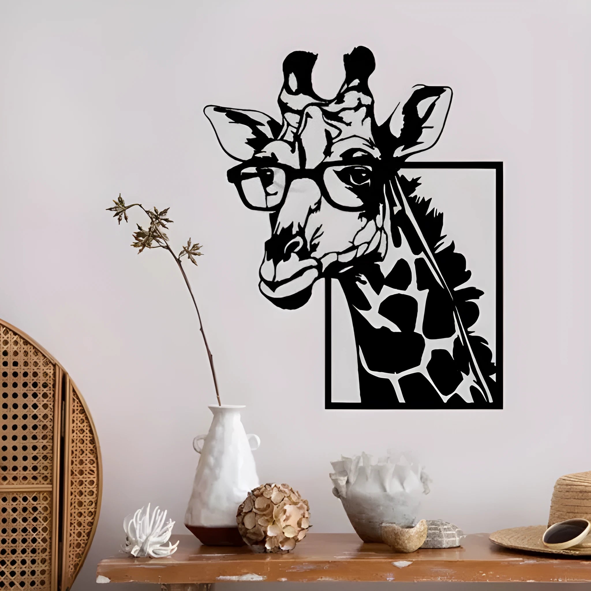 Black iron giraffe silhouette wall hanging with glasses in American country style on a wall