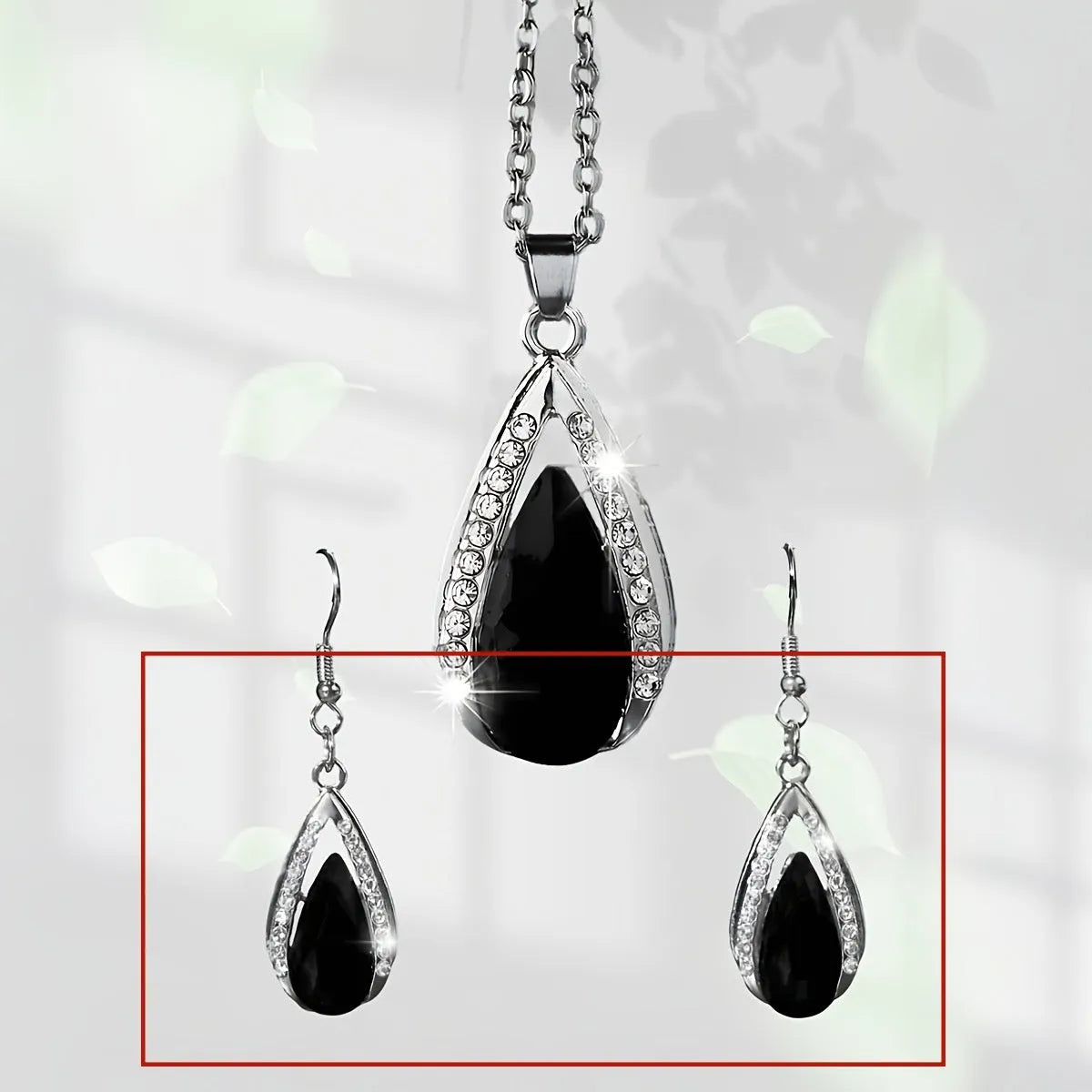 Black and red alloy necklace and earrings set with matching teardrop pendant and droplet earrings.