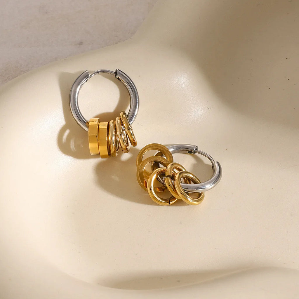 Stainless steel electroplated earrings in INS style, available in two colour options.