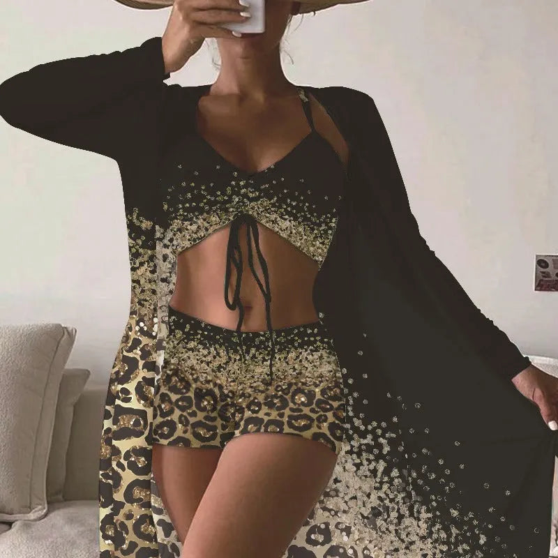 Women's three-piece swimsuit set showing sleeveless top, high-waisted shorts, and matching coat in polyester fabric