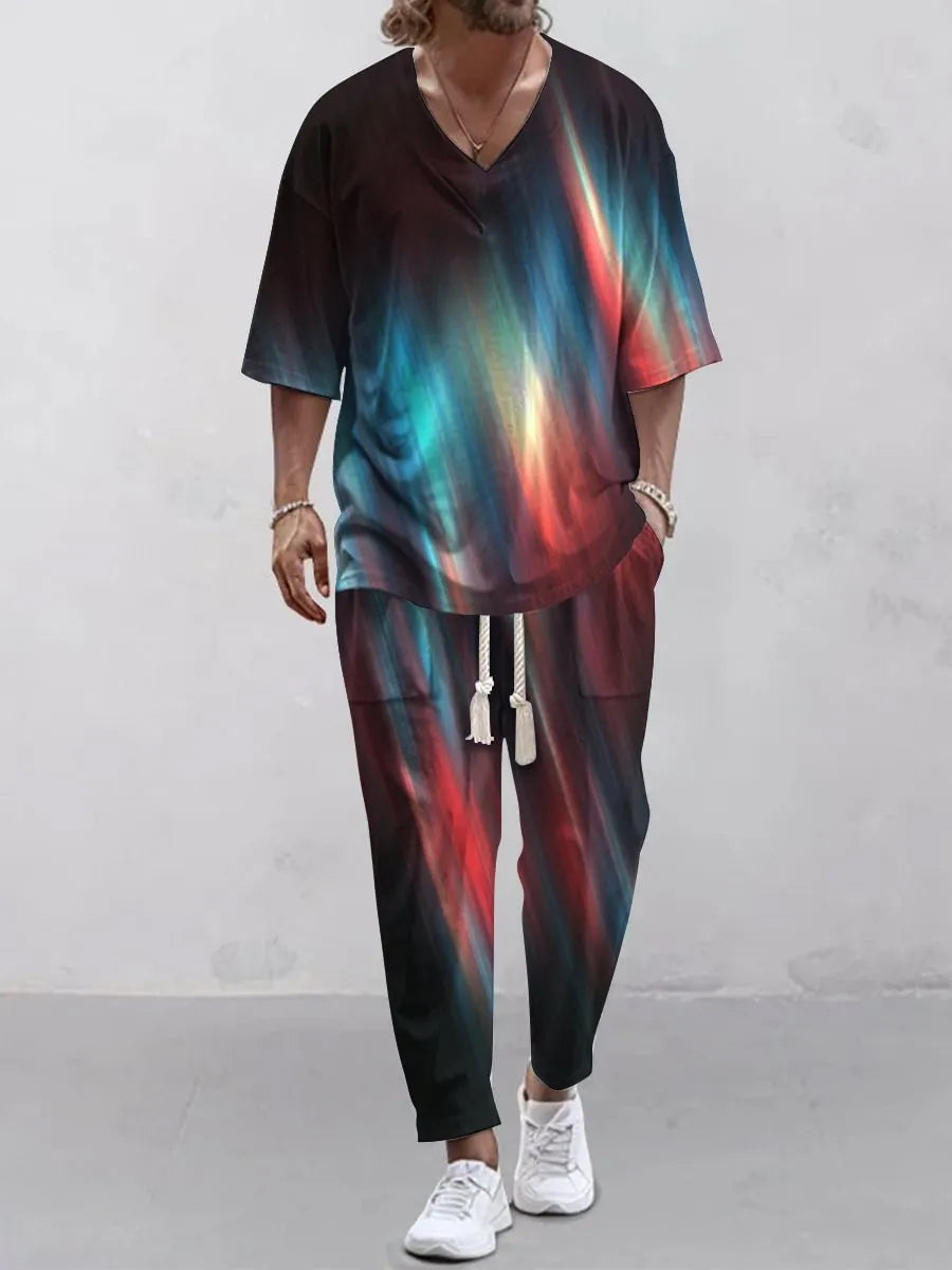 Cropped sleeve V-neck jacket and matching trousers suit on a hanger.