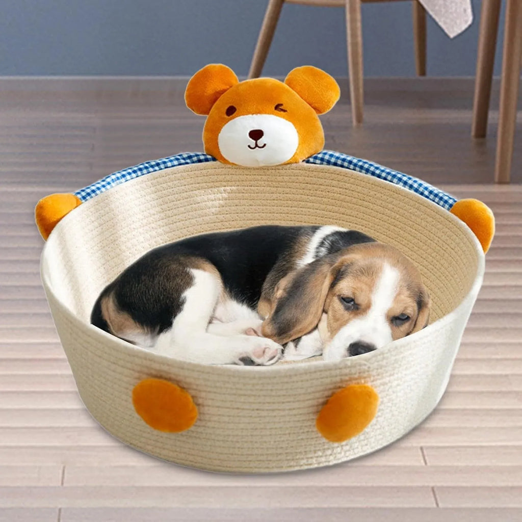 Woven cotton rope cat bed with scratching surface, shown with bear decoration in medium size.