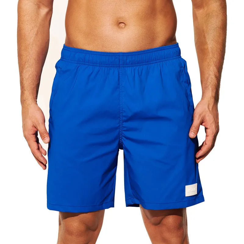 Men's solid colour quick-drying nylon sports shorts in straight leg style