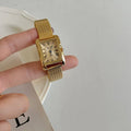 Lady's Roman retro square quartz watch with metal strap and glass face