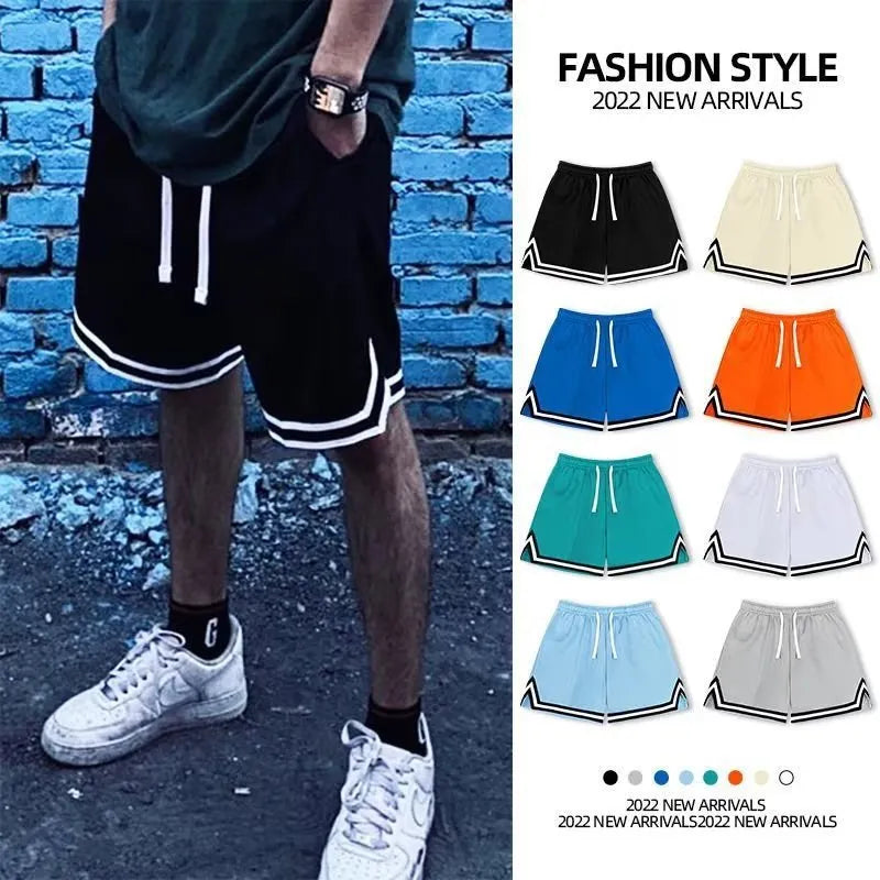 Men's loose fit sports shorts in polyester fabric shown in multiple colour options.