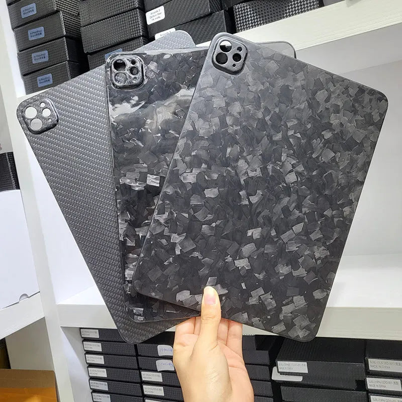 Carbon fibre flat hard protective cover for Apple iPad Pro 11 showing embossed plaid pattern.
