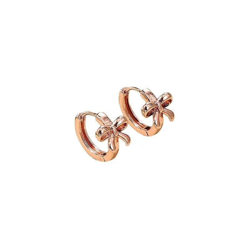 Women's copper electroplated earrings in gold silver rose gold with bow cherry diamond or hollow designs for daily commute
