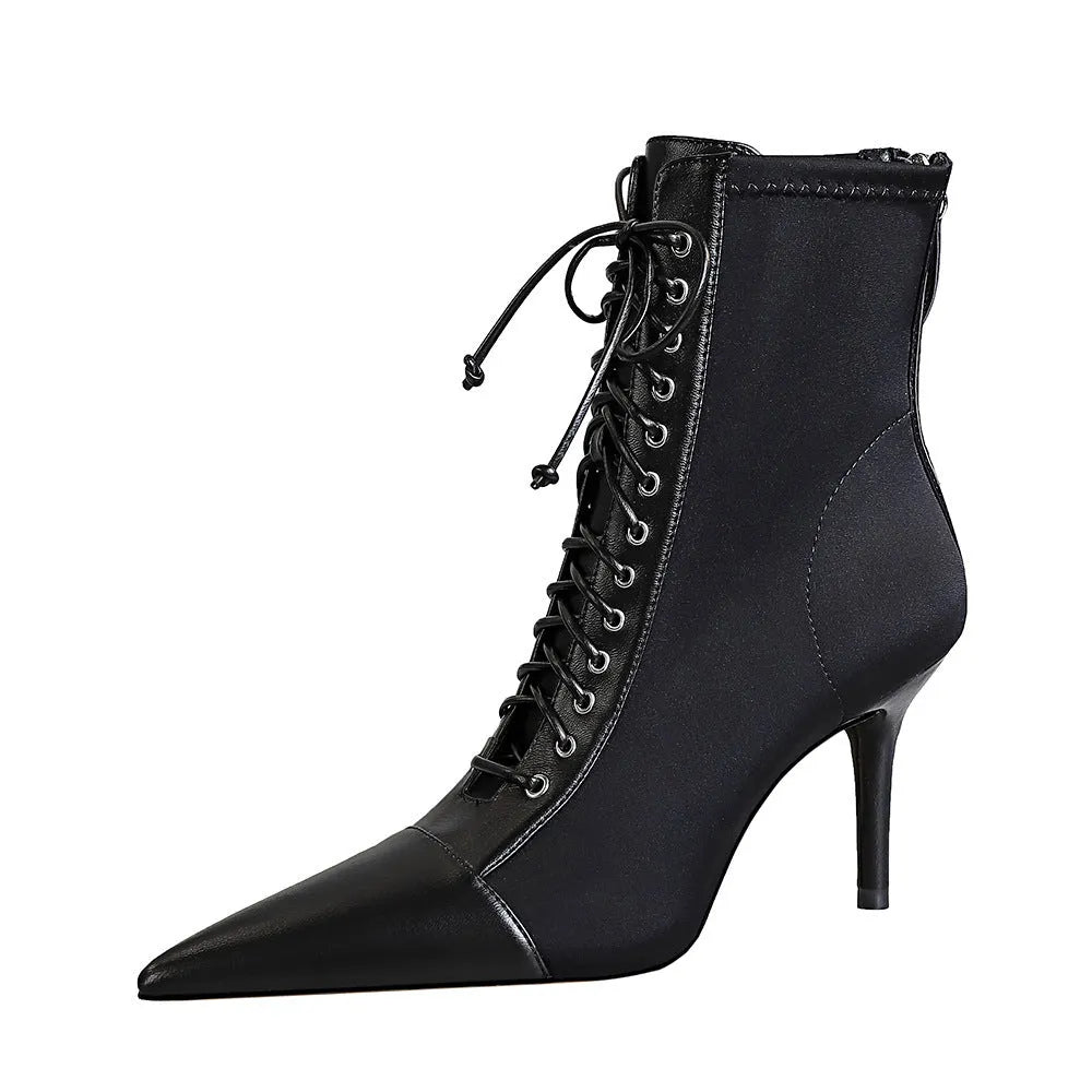 Black women's stiletto heel boots with pointed toe, back zipper, and 6-8CM heel