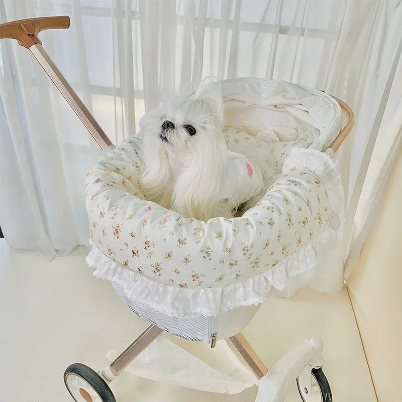 Pure cotton pet stroller pad set showing anti-dirty towel, cushion, and pillow in a blue green apple pattern.