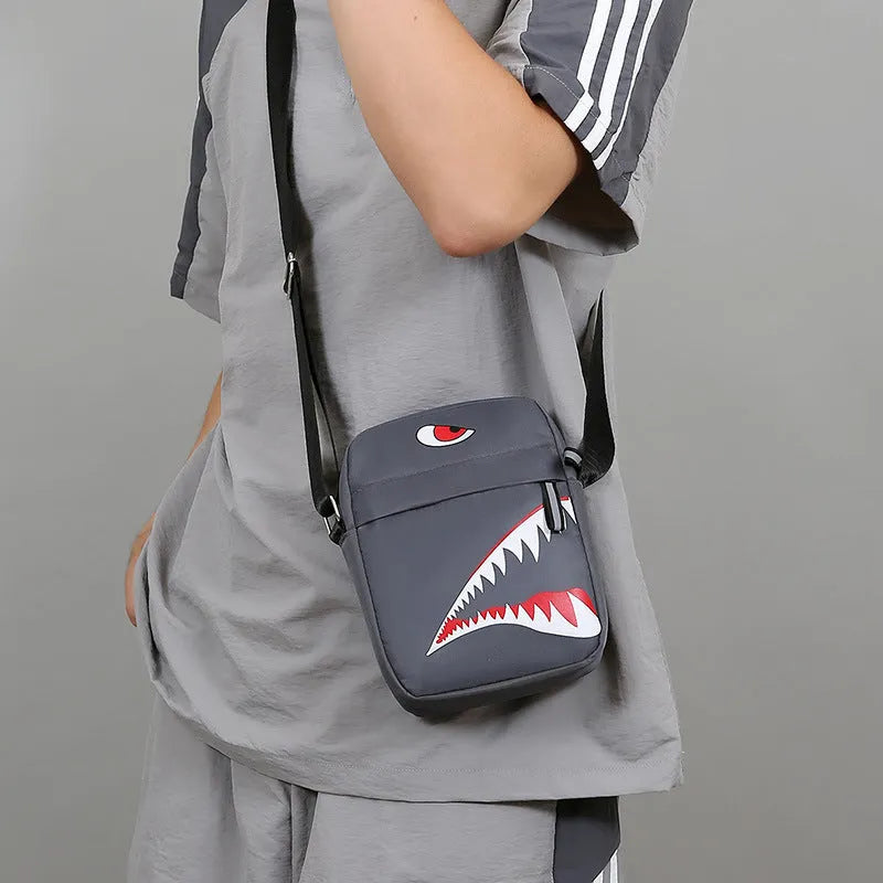 Men's small Oxford cloth crossbody bag with animal print pattern in black, grey or green colours