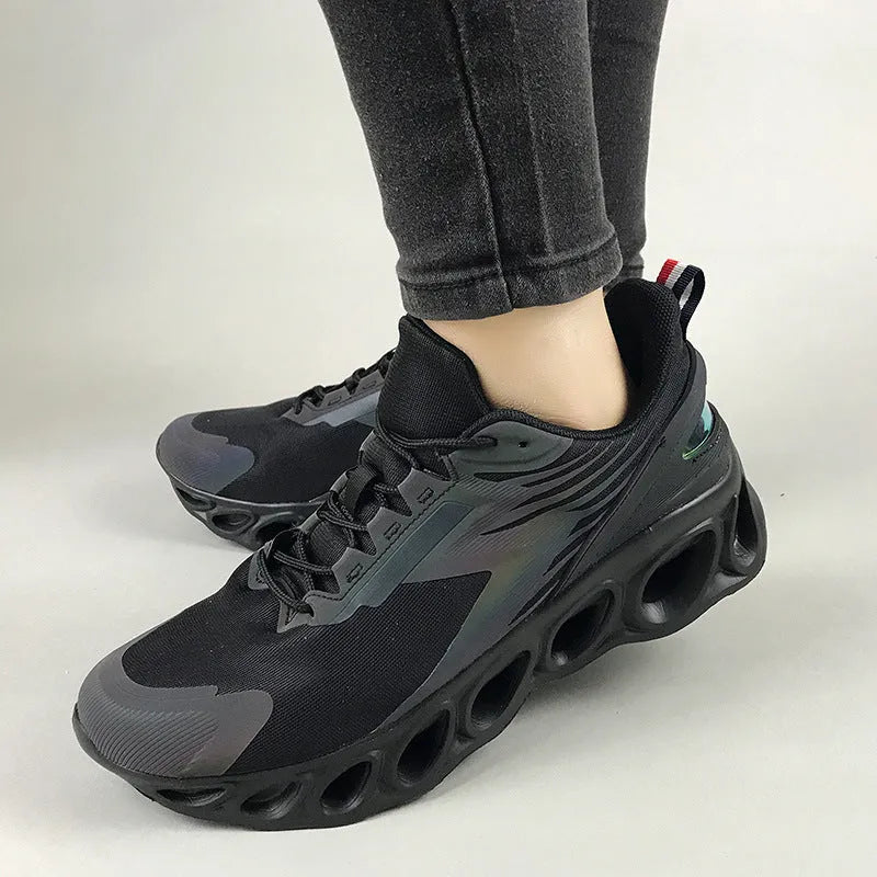 Men's casual sports shoes with mesh upper, round toe, lace-up design in black, white, and dark blue colours