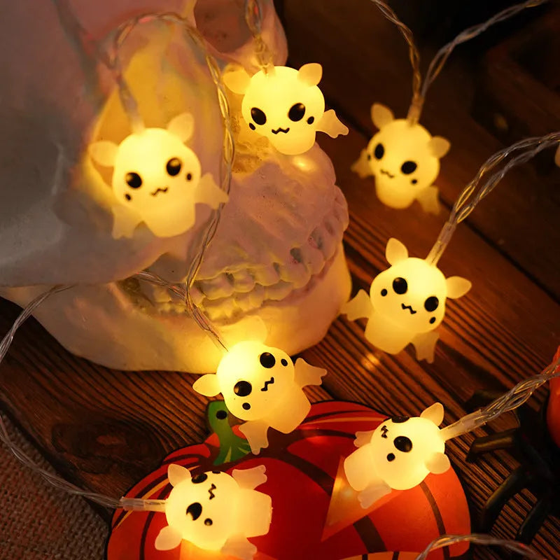 PVC Halloween lighting chain with pumpkin, ghost and bat shapes in warm white LED glow