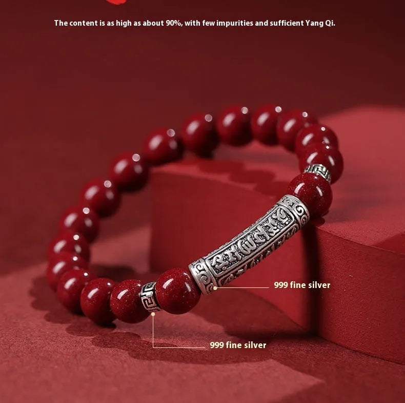 Handmade cinnabar bracelet with purple gold sand beads in a unisex national style design.