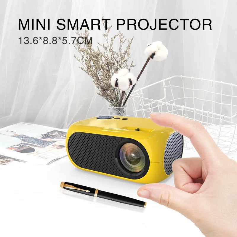Compact M24 portable mini projector in gold or white finish with regional power adapters