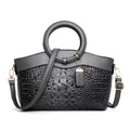 A casual fabric ladies handbag showing internal phone slot and ID card slot.