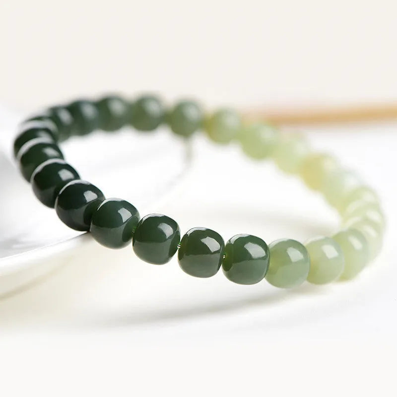 Hetian Jade bracelet with water gradient colour on polished beads.