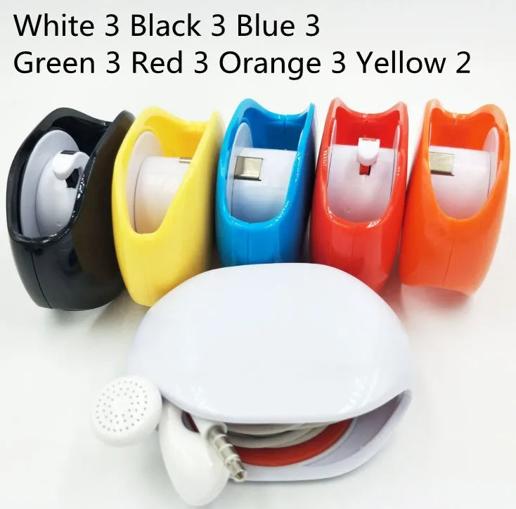 Compact automatic earphone winder in multiple colours on a grey background, showing extended cable.