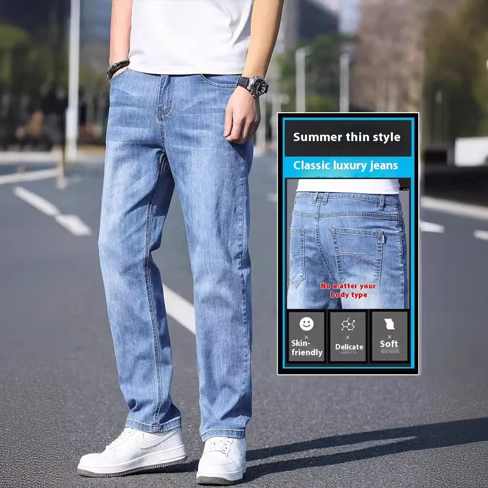 Tapered fit stretch denim trousers for business casual wear in light blue, grey, blue-grey, or black.