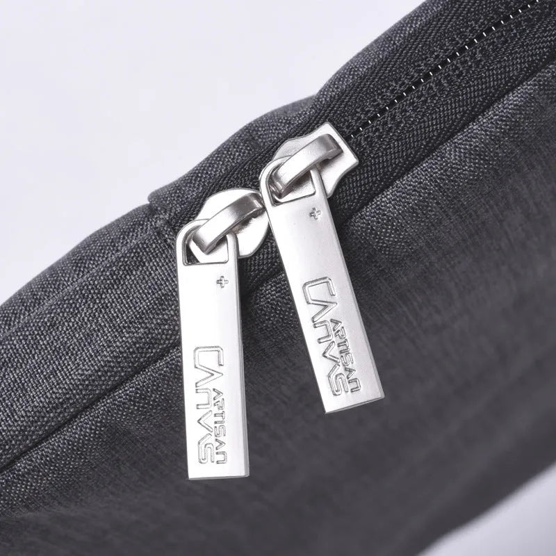 15-inch water repellent polyester laptop liner in light grey, slim design for laptop protection