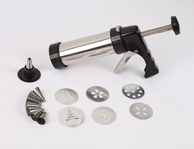 Stainless steel biscuit press cookie gun with assortment of metal cookie molds and piping nozzles