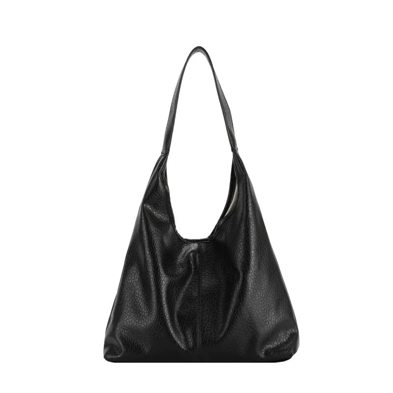Women's large capacity soft PU shoulder bucket bag with contrast stitching in silver, front view