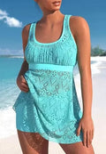 Women's solid colour conservative split two-piece swimsuit with sleeveless top and briefs.