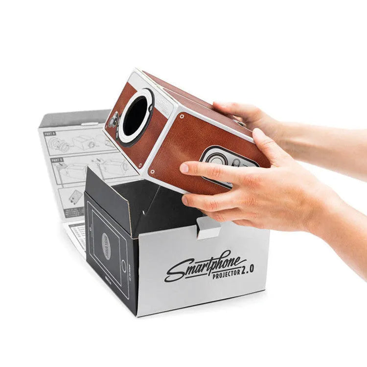 Portable DIY smartphone projector with zoom lens and smartphone insert slot, 8x magnification for home theatre use